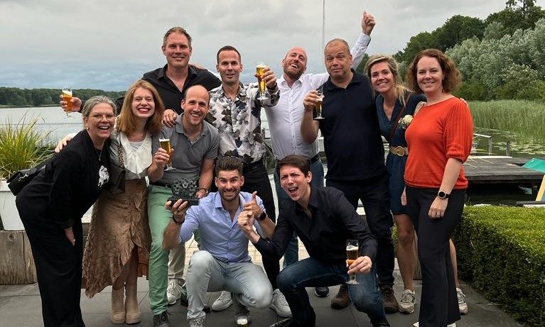 Een feestelijk moment met het team — research is teamwerk