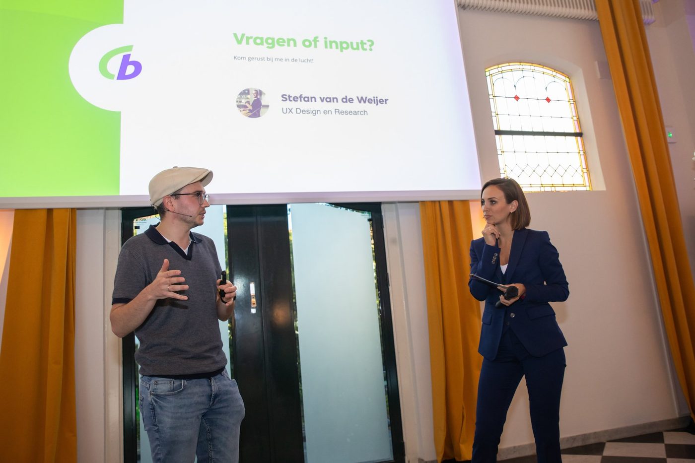 Stefan op het podium tijdens een keynote